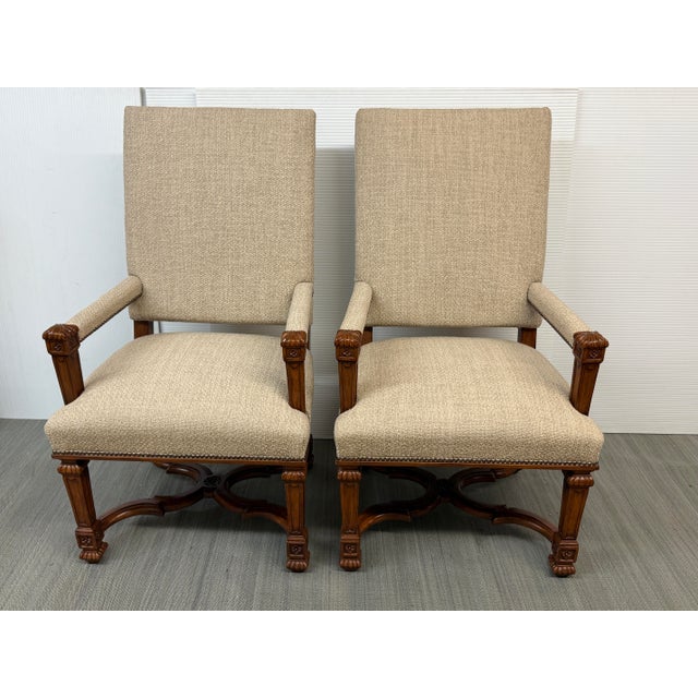 Design Plus Gallery presents a Pair of Reproductions Carved Wood High-Back Armchairs from Charles Pollock. These stately...