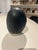 Dimensions: 5” w x 8” h Material: stoneware Finishing: unglazed Color: black Edition: one-of-a-kind