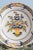 This late 18th-century French faience dish from Desvres features a polychrome decor of basket of flowers and foliage. A...