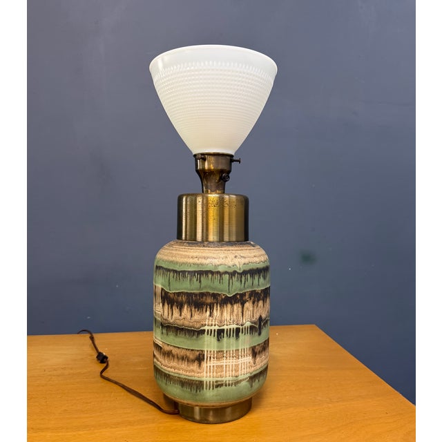 A striking mid-century studio ceramic table lamp attributed to Marianna von Allesch or Design Technics (the New York...