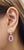 Experience the epitome of luxury with these exquisite drop earrings. Showcasing natural, stunning pink sapphires weighing...