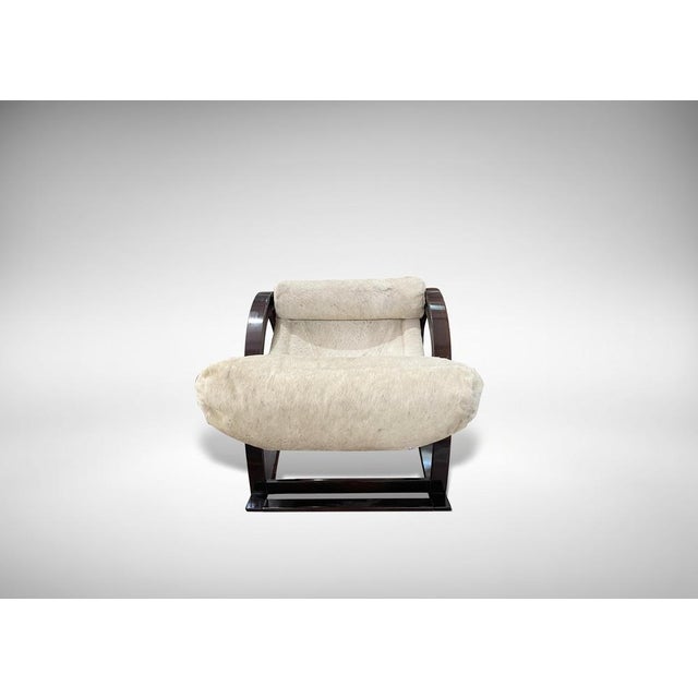 Sgarsul Rocking Chair by Gae Aulenti for Poltronova, Italy 1960s. Varnished wood with original white pony leather...
