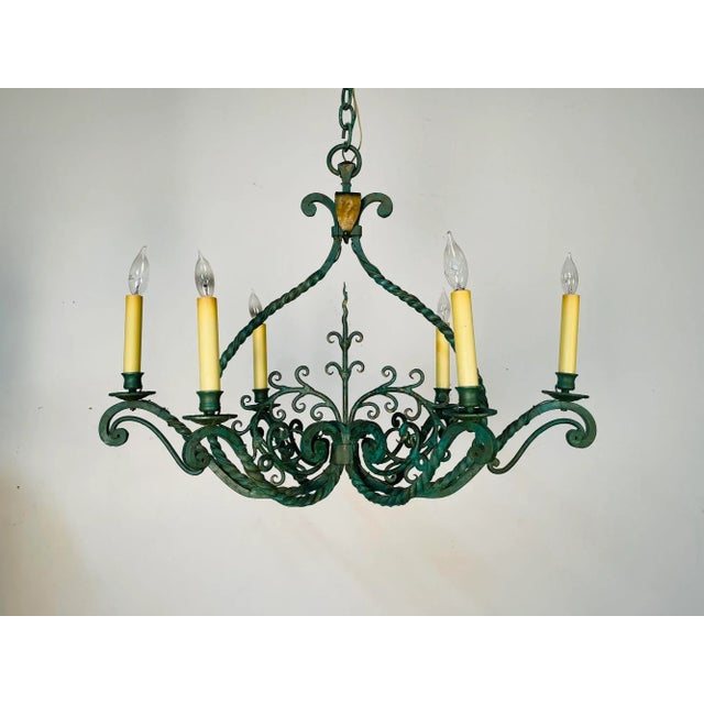 Wrought Iron Industrial Green Painted Chandelier, Circa 1930s The whole of retangular form with scroll and vine design....
