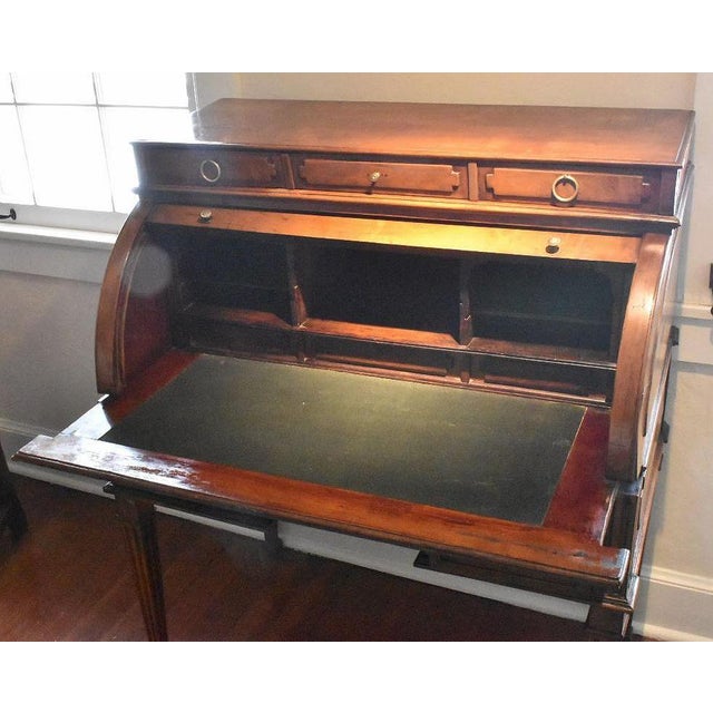 A country French Louis XVI cylinder front desk, early 19th century. On this desk, the cylinder front drops down at your...