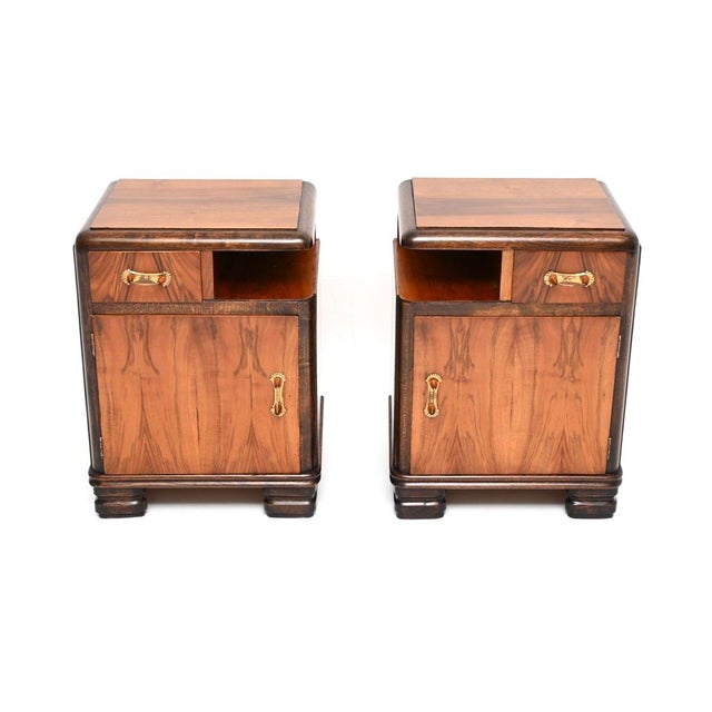 A superb pair of Swedish Art Deco walnut bedside cabinets. They were recently imported from Sweden, they date from the...