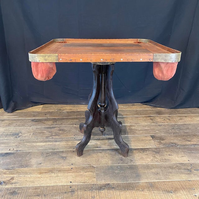 This early Americana game or card table is a slice of American history! All skillfully handmade, it is a lovely piece of...