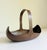 We present to you an original Arts and Crafts period hand-hammered copper "Canoe" flower basket attributed to the renowned...
