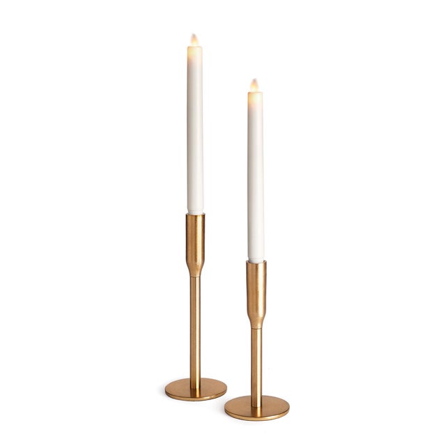 Forged metal, sleek in design. The Killian Taper candleholder is made for the modern home. Pairs perfectly with our...