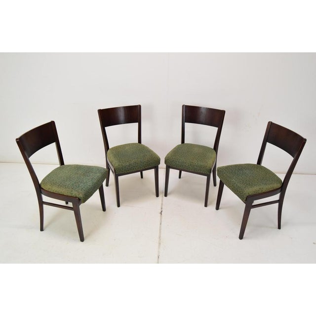 Made in Czechoslovakia Made of Fabric, Oak, Wood. The fabric is suitable for reupholstery The wood was washed and a hard...