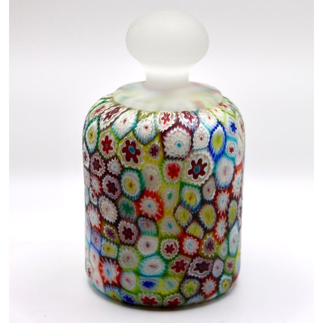 A striking mid-century modern hollow-blown art glass paperweight or decorative container, expertly crafted in Murano,...