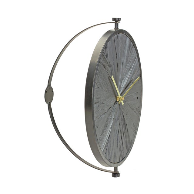 Elevate your home decor with this Modern Wood Wall Clock with Suspended Stand. Combining sleek black iron and painted...