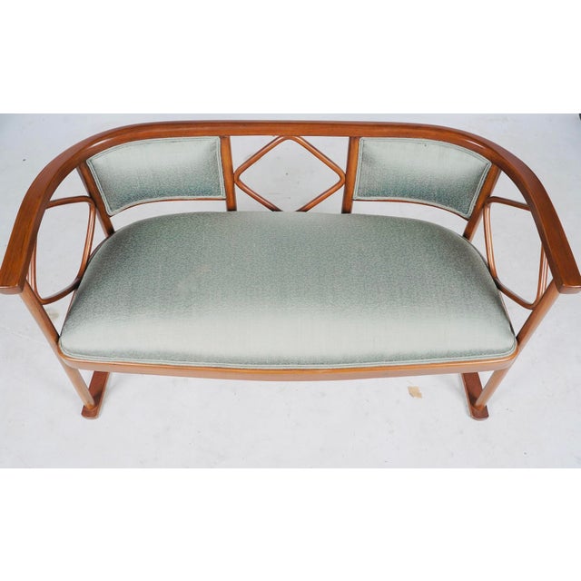 Elegant and sophisticated, this attributed Josef Hoffmann bench embodies the refined geometry and restrained ornament that...