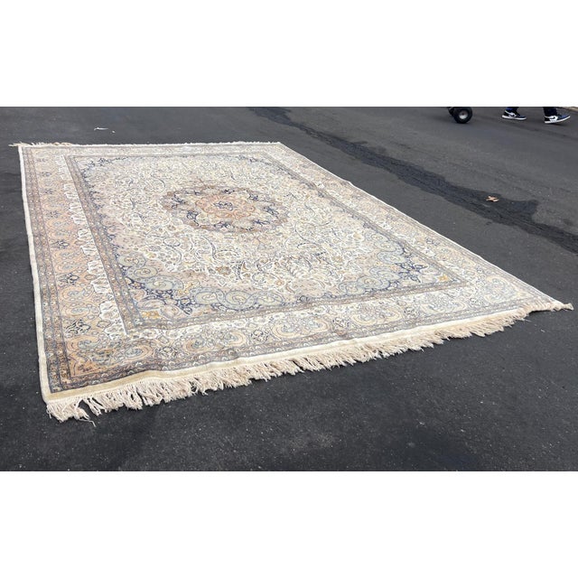 authentic handknotted Persian rug finally woven with a soft wool pile in neutral shades. Timeless, versatile, and in...