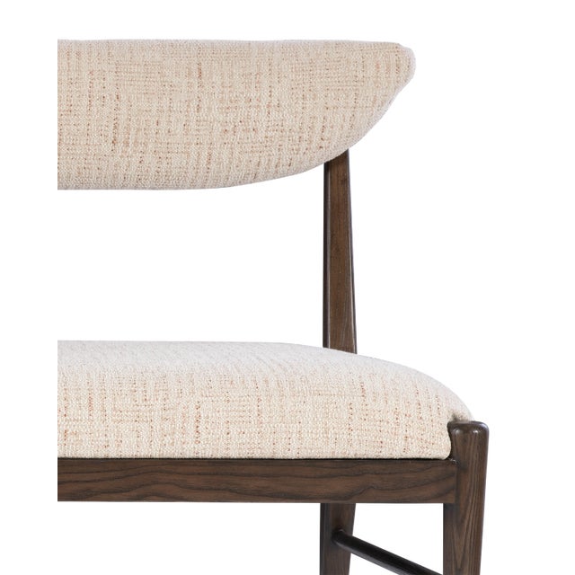 The Arlan Coffee Bench, which is made of ash wood in a coffee brown finish, has tailored contemporary lines. The back and...