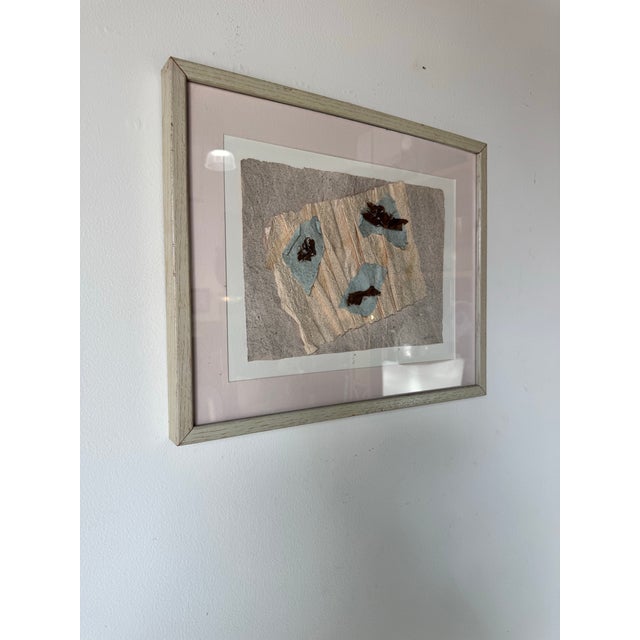 This unique vintage mixed media artwork features an abstract composition with layered textured paper, organic shapes, and...