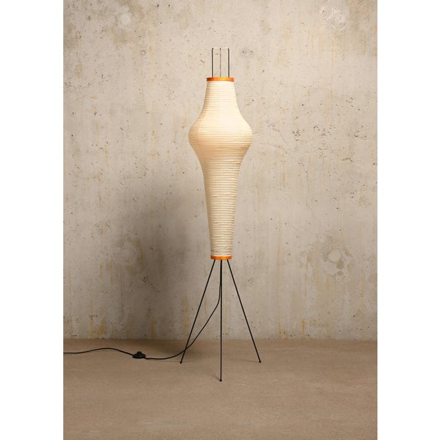 Akari light sculpture (model 14a) by isamu noguchi handcrafted from traditional washi paper and bamboo. Each akari light...
