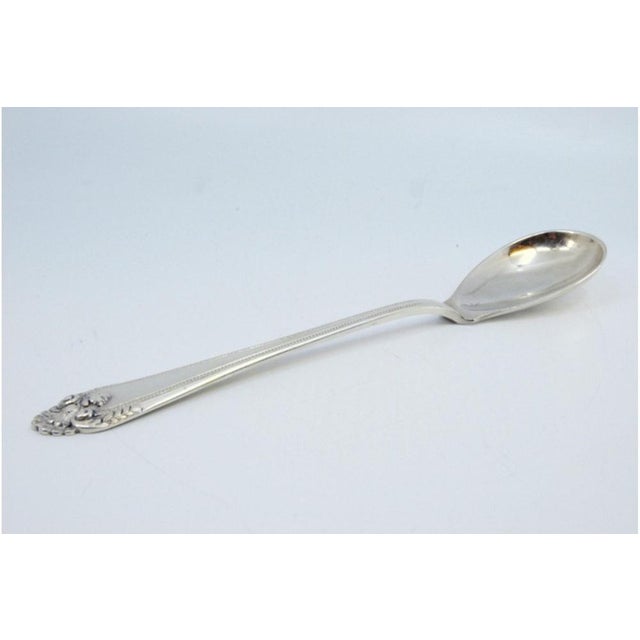 Silver Rice and Serving Spoon with Pear-Shaped Ladle and Grooves, in Very Good conditions. Designed 1920 to 1949 This...
