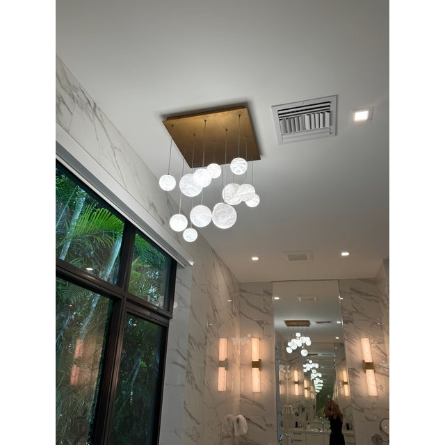 Modern Forms 'Pisces' Chandelier - Embracing the art of light, a multitude of natural Spanish Alabaster orbs shimmer at...