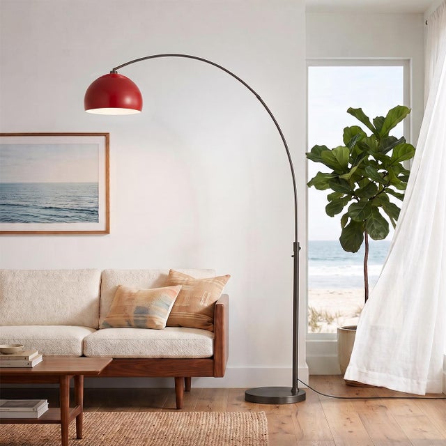 Designed by Peter Morelli in 1960, the Half Dome Arc Lamp is a modern masterpiece featuring a black nickel steel body and...