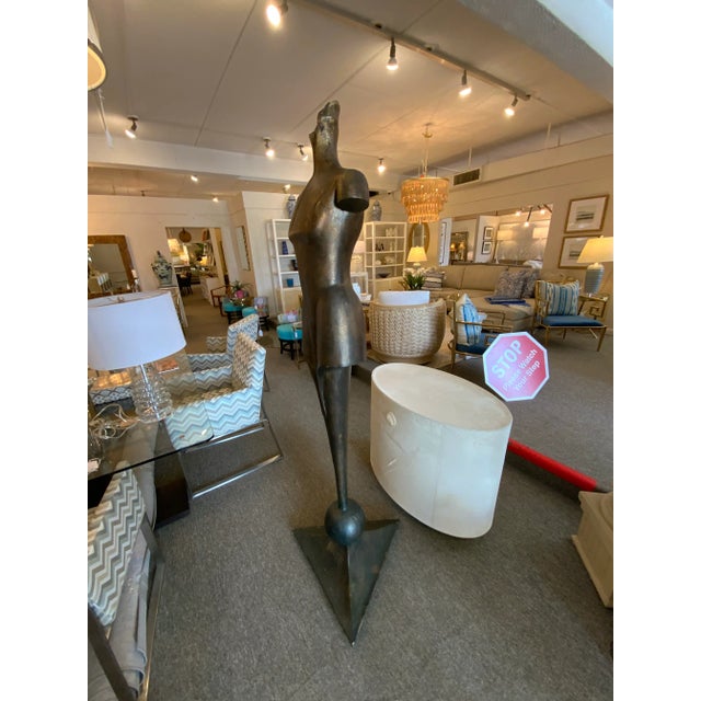 Elevate your decor with the timeless elegance of this neoclassical modern bra once statue, droned with subtle gold...