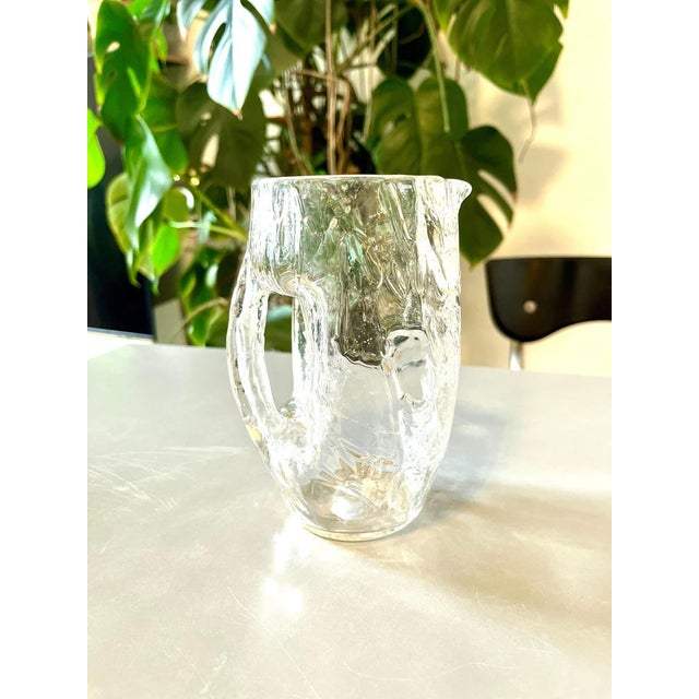 A beautiful mouth blown Art Nouveau / Jugendstil glass pitcher, dated around 1900, designed by Vienna Secessionist Kolo...