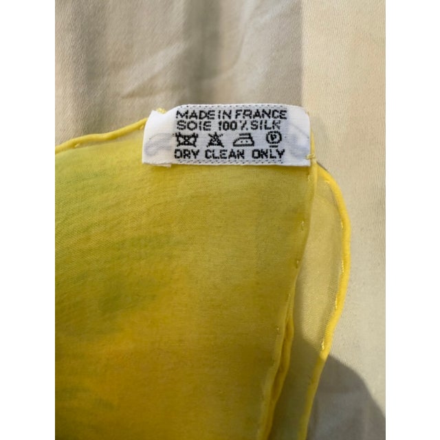 A dreamy and ethereal Hermès mousseline silk scarf featuring the beloved Bouteilles à la Mer (Bottles at Sea) design....