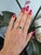 A 1.8-carat tsavorite garnet blazes in vivid, grass-green at the centre of this solid 14K yellow gold ring, set east-west...