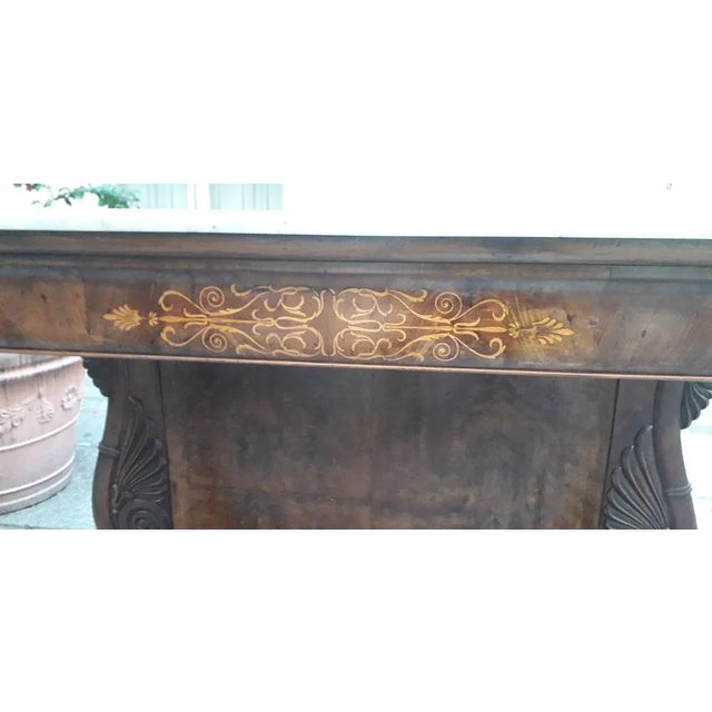 Antique console table from the Charles X period (1840), made in Italy in the Piedmont region, high quality walnut wood...
