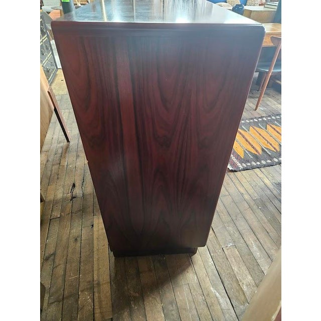 This is a mid-century modern highboy dresser was handcrafted by the premium Canadian manufacturer, Mobican. Marrying...