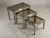 A set of 3 small nesting coffee tables, post-modernist, bauhaus, shabby-chic, space-age, square-section steel structures,...