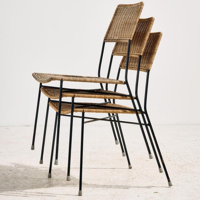 Rattan chair from the 1970s with natural details. The chair’s frame is made of metal, while the seat and backrest are made...