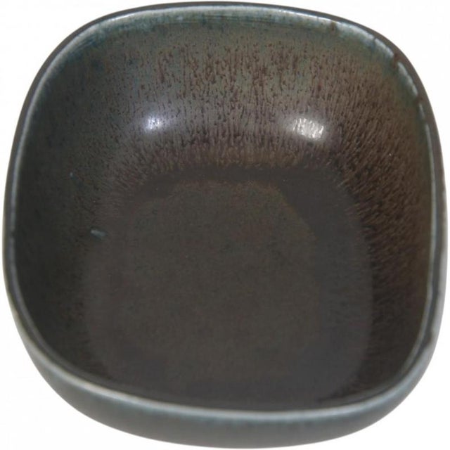 Saxbo oval bowl marked on the bottom, reddish brown glaze, Ø: 18 cm H: 7 cm.