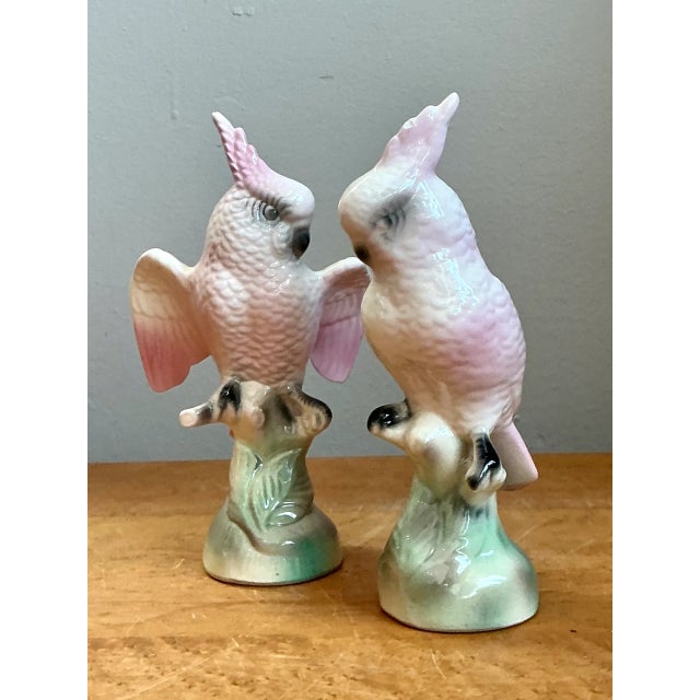 This pair of vintage ceramic cockatoo figurines brings mid-century decorative charm to any tabletop or curated vignette,...