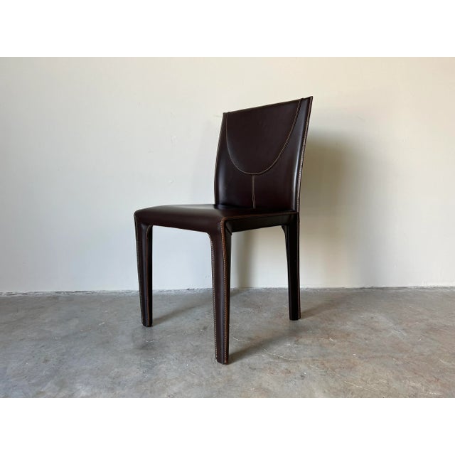 A stylish and top quality Italian Postmodern style accent - desk chair, fully upholstered in a brown leather, these were...