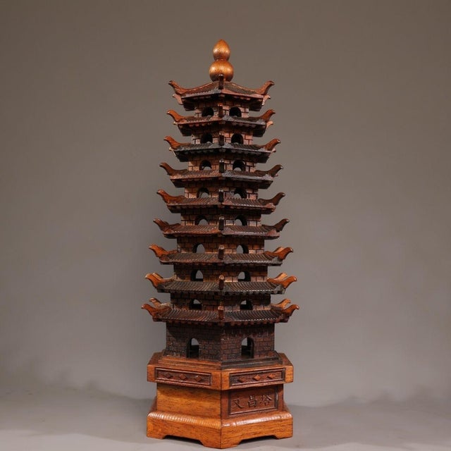 This finely crafted nine-tier pagoda tower is a classic representation of traditional scholarly décor. Hand-carved from...