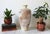 Gorgeous vintage studio pottery vase featuring an incised dragon motif. Pale, cream-tinted body and the way the reddish-...