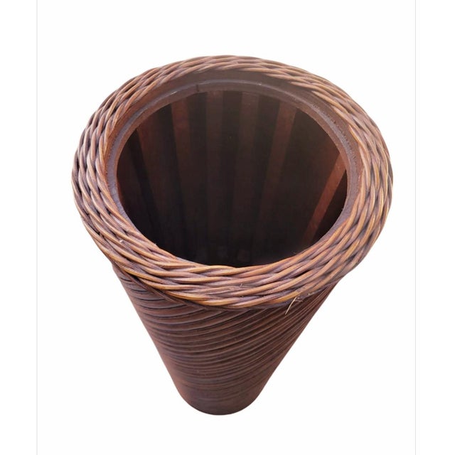 A wonderful vintage mid century modern pencil reed cylindrical planter or pedestal. This is a versatile piece which was...