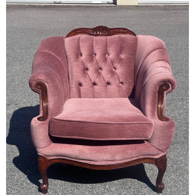 Elegant and timeless, this vintage French Provincial armchair brings a soft, romantic presence to any space. Upholstered...