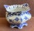 Features delicate reticulated lace work along the upper rim combined with cobalt blue hand painted floral designs.