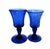 These are blown glass and individually hand made, which explains why they don't exactly match. One is slightly taller....