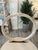 Elevate your space with this large light wood ring sculpture, featuring a striking single, elegantly crafted ring. The...