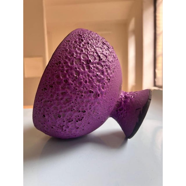 A very special color in Scheurich's production was purple, created using the Fat Lava glaze technique. This unique piece...