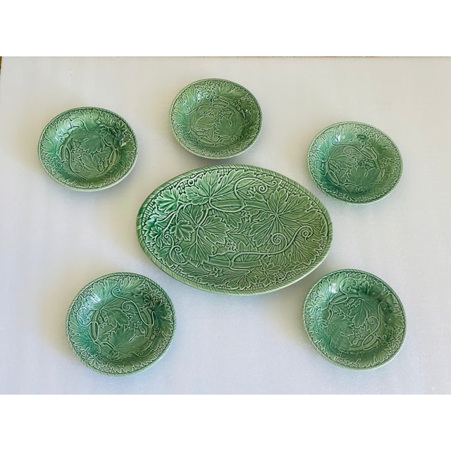 Green majolica set by Portugees Bordallo Pinheiro of a platter with 5 salad plates.
