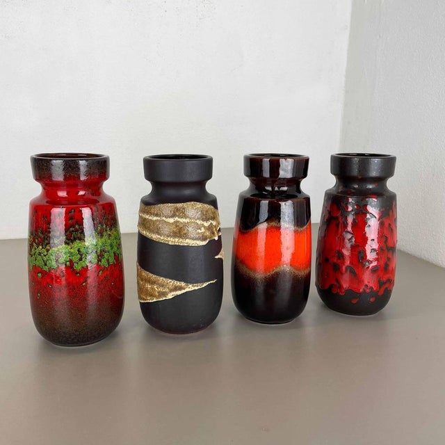 These original vintage vases was produced in the 1970s in Germany. It is made of ceramic pottery in fat lava optic. Super...
