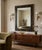 This exceptional hand-painted wall mirror serves as a commanding visual anchor, seamlessly blending old-world...