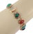 The Cabochon Multicolor Gems 14k Rose Gold Oval Link Chain Bracelet is a vintage piece of fine jewelry featuring a unique...