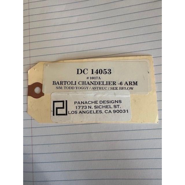 This light for Panache Designs features a radial design where each arm extends gracefully from a central hub. With hand...