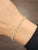This elegant tennis bracelet is a masterpiece of modern design, crafted to captivate with its refined simplicity and...