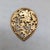 1970s tear drop shaped goldtone cut out rearing lion coat of arms brooch with security clasp. Marked "NAPIER©" on the...