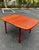 Mid-century modern danish teak extendable dining table with butterfly self-storing leaf. A sleek and streamlined design...